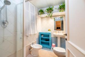 Koupelna v ubytování Cottage L'Antico Frantoio