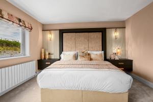 Ein Bett oder Betten in einem Zimmer der Unterkunft 72 The Westpoint Way