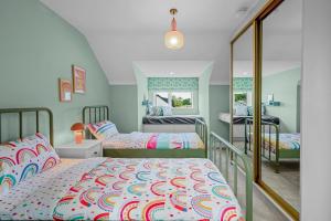 Ein Bett oder Betten in einem Zimmer der Unterkunft 72 The Westpoint Way