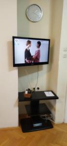 a flat screen tv hanging on a wall at Tara 1 in Bitola