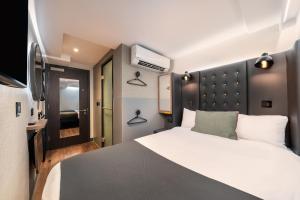 Letto o letti in una camera di Point A Hotel London Westminster