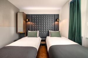 Letto o letti in una camera di Point A Hotel London Westminster