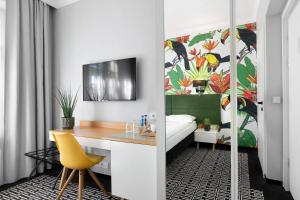 TV a/nebo společenská místnost v ubytování Liv'Inn Aparthotel