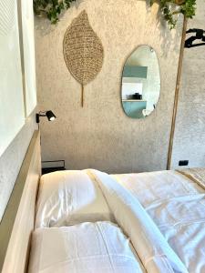 En eller flere senge i et værelse på Saltéa Beach House Noordwijk