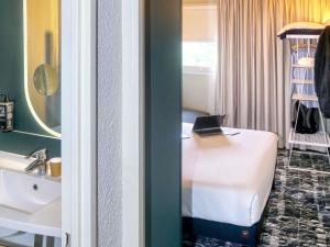 Postel nebo postele na pokoji v ubytování ibis Biarritz Anglet Aéroport