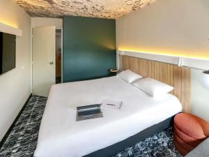 Postel nebo postele na pokoji v ubytování ibis Biarritz Anglet Aéroport