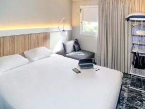 Postel nebo postele na pokoji v ubytování ibis Biarritz Anglet Aéroport