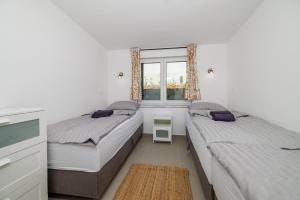 En eller flere senge i et værelse på Blue Adria Pearl House + 33 billeder