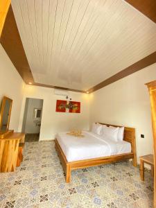 Postel nebo postele na pokoji v ubytování SUN RESORT GILI TRAWANGAN + 31 fotografií