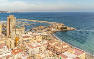 an aerial view of a city and the ocean at Gorgeous Apartment In Fuengirola in Fuengirola +15 photos