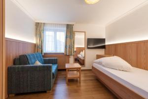 TV a/nebo společenská místnost v ubytování Heart Hotel Arlberg