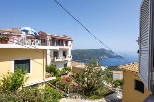 a view of the amalfi coast from a building at Family House in Lakones in Paleokastritsa