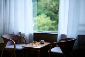 Posezení v ubytování LiVEMAX RESORT Kaga Yamashiro