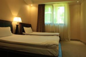 Postel nebo postele na pokoji v ubytování Villarest Dilijan