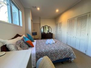 Ένα ή περισσότερα κρεβάτια σε δωμάτιο στο Birkenhead Pt -Seaview 3Bed3Bath