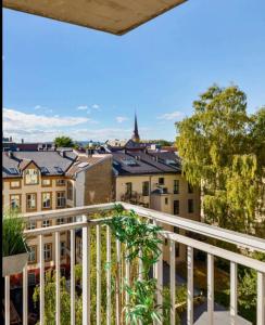 a balcony with a view of a city at Grunerløkka House - Oslo in Oslo