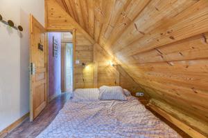 Ένα ή περισσότερα κρεβάτια σε δωμάτιο στο Auberge Passoud 202