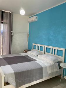 Postel nebo postele na pokoji v ubytování Brezza Del Mare