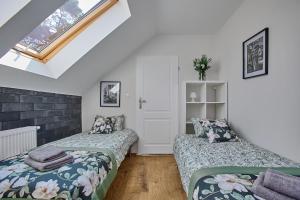 Postel nebo postele na pokoji v ubytování Apartamenty Śniadanie do Łóżka + 91 fotografií