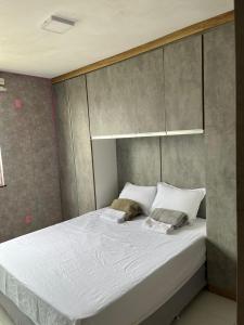 Postel nebo postele na pokoji v ubytování Apartamento moderno e bem localizado