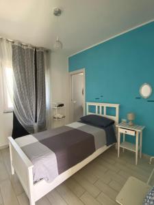 Postel nebo postele na pokoji v ubytování Brezza Del Mare