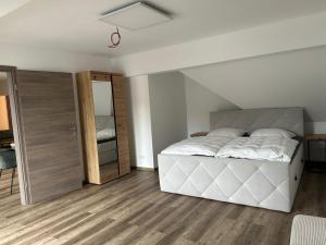 Postel nebo postele na pokoji v ubytování Haus Padberg