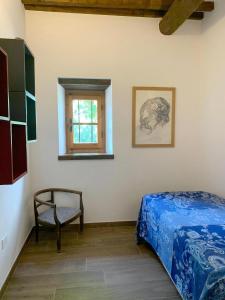 Ένα ή περισσότερα κρεβάτια σε δωμάτιο στο Casa Chimera