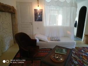 Posezení v ubytování Chambre cosy indépendante chemin du lavoir