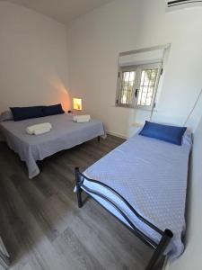 Postel nebo postele na pokoji v ubytování Residence Toscano
