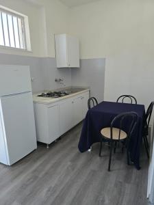 Kuchyň nebo kuchyňský kout v ubytování Residence Toscano