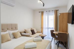 TV a/nebo společenská místnost v ubytování Apartments Donna