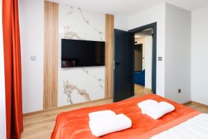 Postel nebo postele na pokoji v ubytování Boulevard Hotel