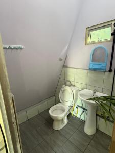 Ванная комната в Lepau Homestay Mukah +3 фотографии