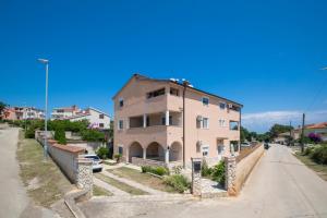 a building on the side of a street at Sea Nest Ližnjan 2 in Ližnjan
