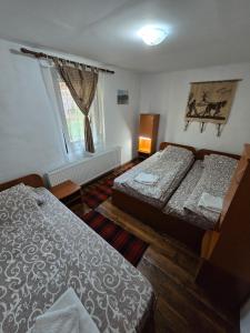 Ліжко або ліжка в номері Seosko domaćinstvo „GABAR”