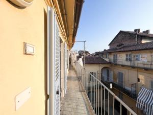 a view of a balcony from a building at Monolocale in Asti Centro in Palazzo storico 30min da Alba Fiera del Tartufo in Asti
