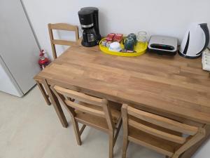 Kuchyň nebo kuchyňský kout v ubytování Oasis