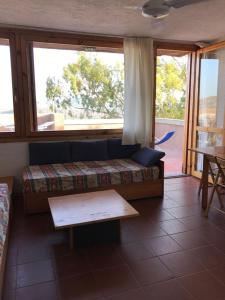 Posezení v ubytování Appartamento vista mare Residence Cugnana Verde