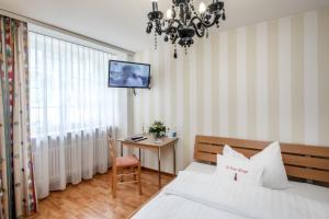 Voodi või voodid majutusasutuse Hotel Roter Turm toas