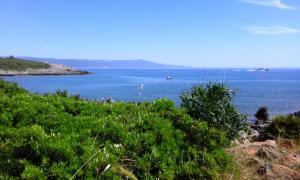 a view of a large body of water at B&B La Casa Bianca di Porto Conte in Porto Conte