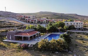 an aerial view of a resort with a swimming pool at Cinarli Kasri in Gokceada Town