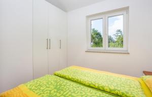 Ένα ή περισσότερα κρεβάτια σε δωμάτιο στο Apartment Nada sea view - Island of Krk