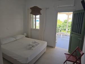 Postel nebo postele na pokoji v ubytování Oasis