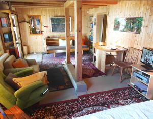 an aerial view of a room with a living room at Haus am Ufer in Gaienhofen