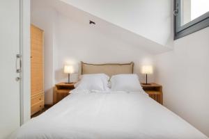 Ένα ή περισσότερα κρεβάτια σε δωμάτιο στο Apartamentos Acebal