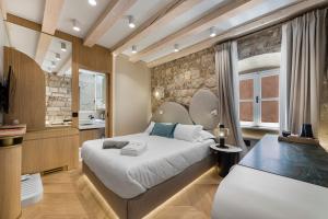 Ένα ή περισσότερα κρεβάτια σε δωμάτιο στο Casa Rosa +102 φωτογραφίες