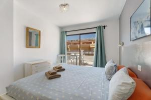 Katil atau katil-katil dalam bilik di 3 bedrooms with views +21 gambar
