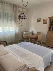 Postel nebo postele na pokoji v ubytování Casa Rosetta Affittacamere