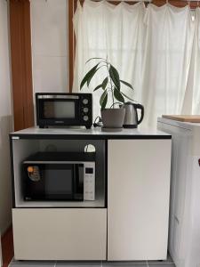 Kuchyň nebo kuchyňský kout v ubytování Quiet and spacious 1-bedroom apt in Gangnam