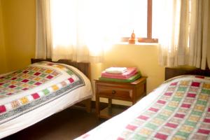 Voodi või voodid majutusasutuse Swayambhu View Guest House toas